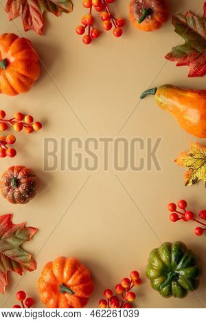 Autumn Flat Lay Background. Vertical Image. Pumpkins And Fall Leaves. Autumn Decorations With Copy S
