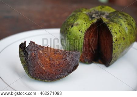 The Black Sapote, Also Known As The Chocolate Pudding Fruit. Exotic Fruit From Mexico. Black Pudding