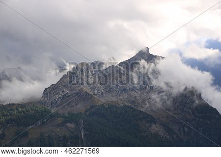Mountains Mittaghore And Schluchhore. Scene In The Swiss Alps.