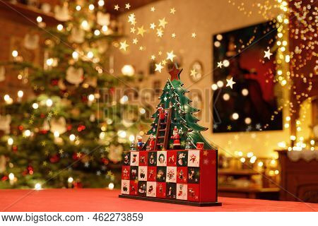 Three-dimensional Advent Calendar With Stylised Christmas Tree In The Middle Of Christmassy Illumina