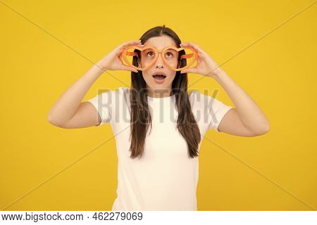 Cheerful Girl In Large Bif Funny Party Glasses Sunglasses. Portrait Of Young Woman Wearing Funny Gla