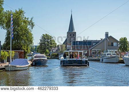 Cruising Through The Traditional Village Warten In Friesland The Netherlands