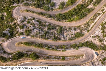 Aerial Top Down View Of Hairbpin Bend Road In Cevennes, Occitania, France