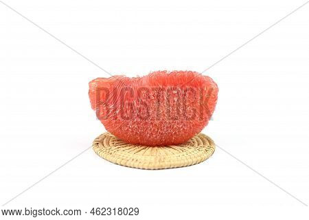 Piece Of Ripe Red Siam Ruby Pomelo , Pummelo, Grapefruit With No Peel On Weaven Isolated On White Ba