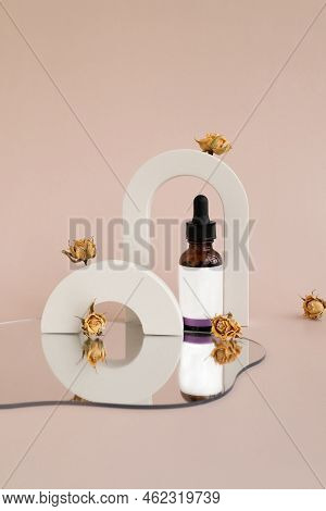 Packaging From A Cream Or Cosmetic Standing On A Mirror