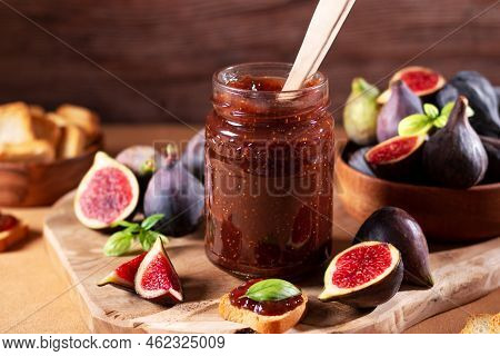 Autumn Preserves From Local Produce, Fig Jam Or Fig Marmalade On Wooden Board With Fresh, Ripe Figs,