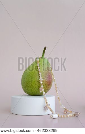Fruits On A Stand On A Monochromatic Background
