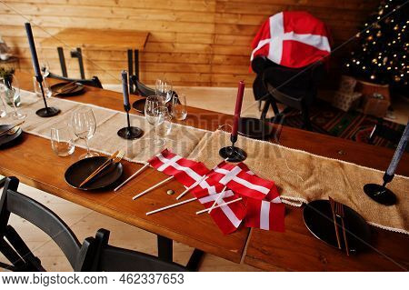 Denmark Flags On Table. Travel To Scandinavian Countries.