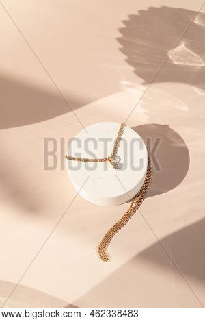 Costume Jewelry On A Monochromatic Background In The Interior
