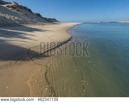 View Of Praia Das Furnas Golden Sand Beach With Turquoise Water Of The Mira River At Vila Nova De Mi