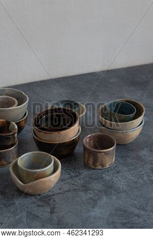 Pottery made of clay. Handmade cups and mugs. High quality photo