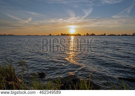 Sunset At The Tjeukemeer In The Netherlands
