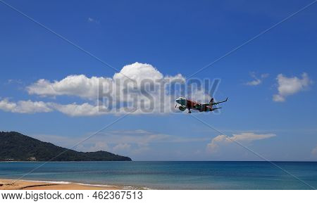 Puket Thailand - May 2022: Airliner Or Passenger Plane Air Asia Airbus A320 Landing To Airport Next 