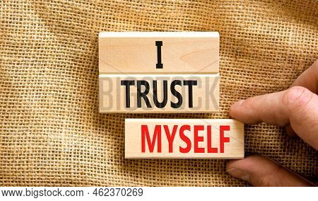 I Trust Myself Symbol. Concept Words I Trust Myself On Wooden Blocks. Businessman Hand. Beautiful Ca