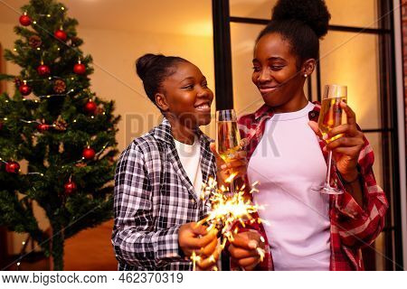 African Women In Pajamas Staying At Home With Sparkers