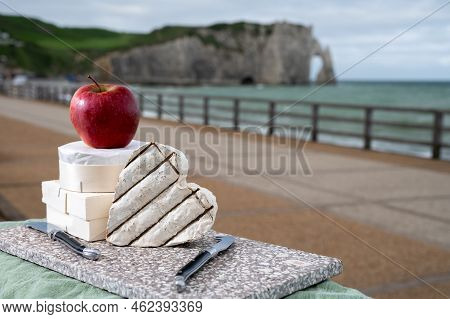 Cheeses Of Normandy, Round Camembert Cow Cheese From Calvados Region And Heartshaped Neufchatel From