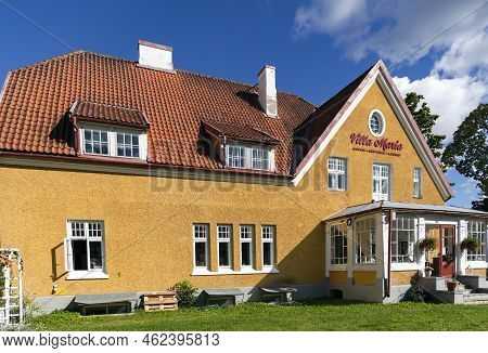 Estonia, Viljandi, September, 2022: Villa Maria Restaurant In A Yellow Renovation House With Glass V
