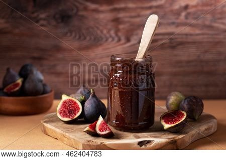 Autumn Preserves, Fig Jam Or Fig Marmalade On Wooden Board With Fresh, Ripe Figs, Still Life