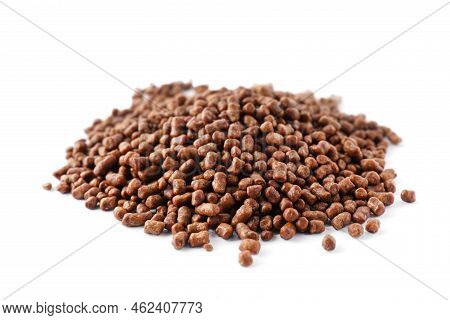 Pile Of Buckwheat Tea Granules On White Background