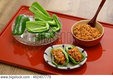 chilled fresh green peppers and Niku Miso (ground pork miso dip), a Japanese appetizer