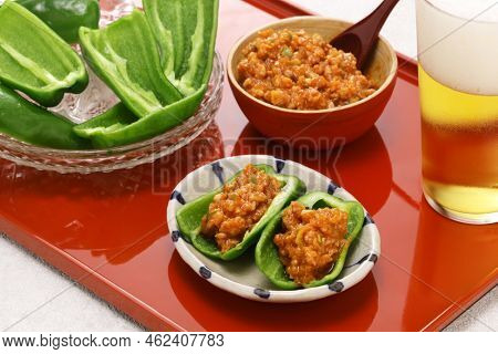 chilled fresh green peppers and Niku Miso (ground pork miso dip), a Japanese appetizer