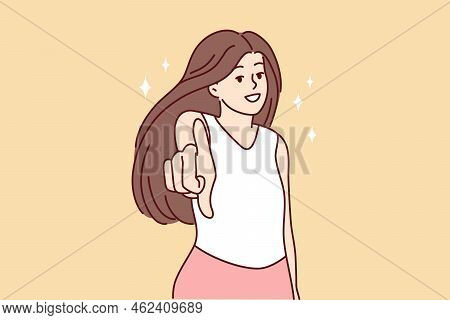 Smiling Woman Look At Camera Making Hand Gesture. Happy Female Point At Screen Make Choice Or Decisi