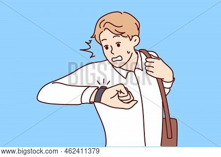 Stressed Man Look At Wristwatch Being Late For Work. Unhappy Guy Check Time Worry About Missed Deadl