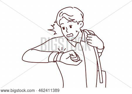 Stressed Man Look At Wristwatch Being Late For Work. Unhappy Guy Check Time Worry About Missed Deadl