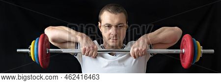 A Strong, Healthy Man With Muscles, Training At Home In The Plank Position. Fitness At Home. Banner.