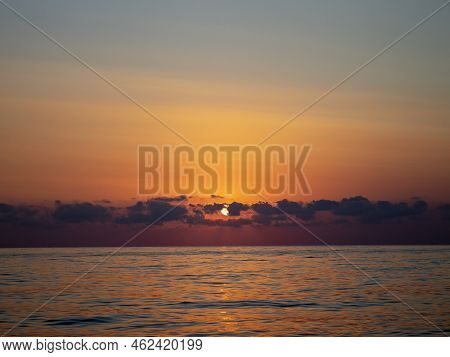 Fantastic Sunset On The Ocean. Nspirational Calm Sea With Sunset Sky. Meditation Ocean And Sky Backg