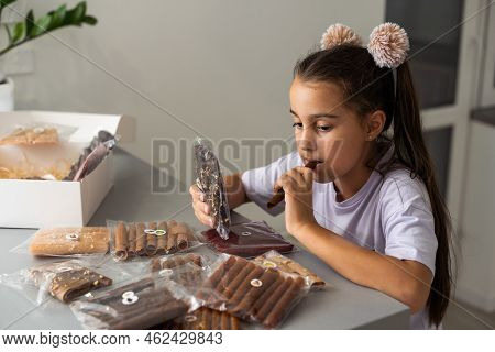 Little Girl With A Box Of Pastilles