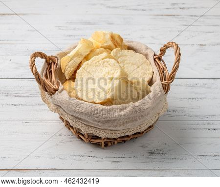 French Bread, Salt Bread Or Pistolet Slices Over Wooden Table.