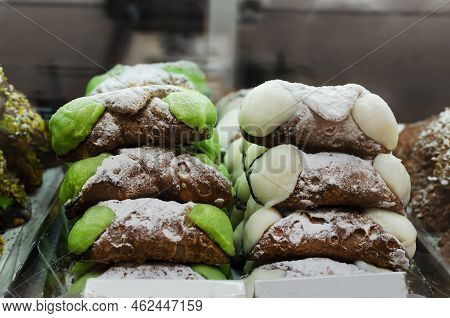 Canolli Sicilian With Pistachio And Ricotta Cream Traditional Italian Sweets. Cookies In The Form Of