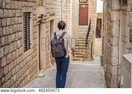 The Man In Ulcinj Town In Montenegro. Clock Tower Of Ulcinj Sahat Kulla. Lami Mosque. Ulcinj Is A Po