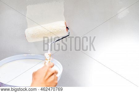 Female Hand Use Roller Brush Painting, Worker Painting On Steel Surface Wall By The Roller Brush For