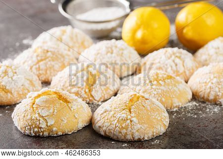 Festive Homemade Cracked Lemon Cookies With Powdered Sugar Close-up On The Table. Horizontal