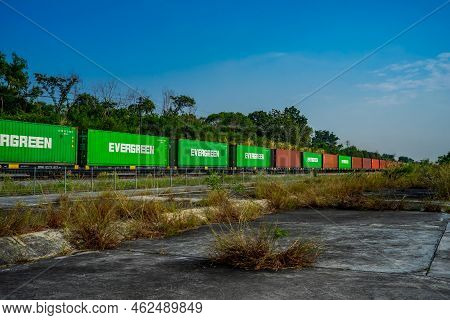 Chonburi Province, Thailand - 21 Nov 2020, The Evergreen Container On The Train Is Driven On Rural R