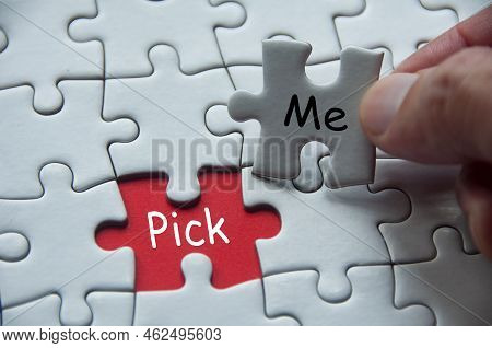 Pick Me Text On White Jigsaw Puzzle. Selection Concept.