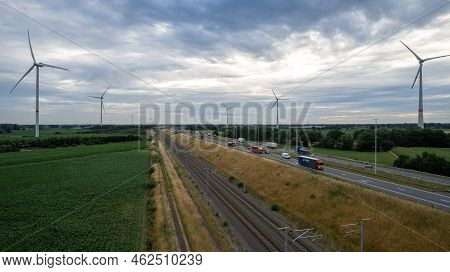 Brecht, Belgium, 6th Of July, 2022, Panoramic Aerial Drone View Of Wind Farm Or Wind Park, With High
