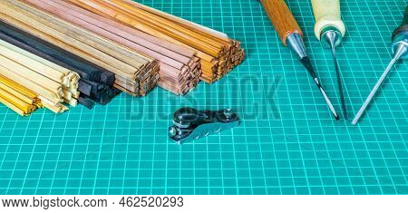 Slats Of Different Types Of Wood And A Tool For Wooden Ship Modeling