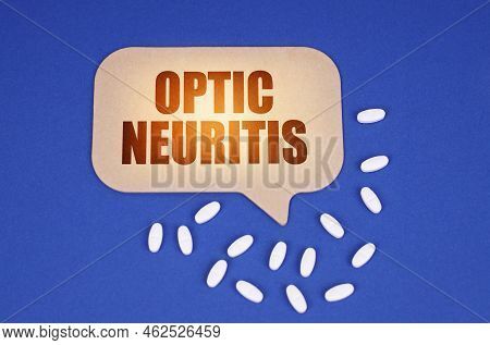 Medical Concept. On The Blue Surface Of The Tablet And A Cardboard Plate With The Inscription - Opti