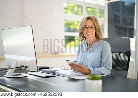 Business Invoice Tax Management. Accountant Using Monitor