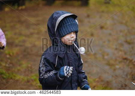 Halloween Games For Kids. Boy Carry Ping Pong Eyeball Holding Spoon In Mouth. Funny Activities For C