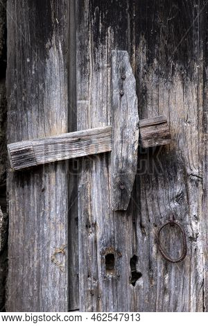 Old Unvarnished Wooden Door Weathered By Time