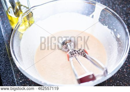 Pancakes Batter On A Kefir Base In A Glass Mixing Bowl.
