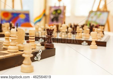 Chess Set On The Chess Board. With Selective Focus On White Pieses.