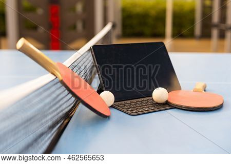 Sport, Technology, Game And Objects Concept - Close Up Of Ping-pong Or Table Tennis Rackets With Bal
