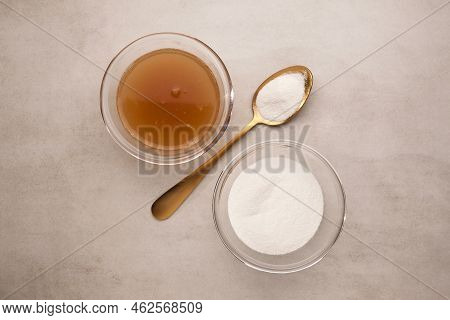 Collagen Powder And Bone Broth With Collagen On Light Stone Background. Extra Protein Intake. Natura