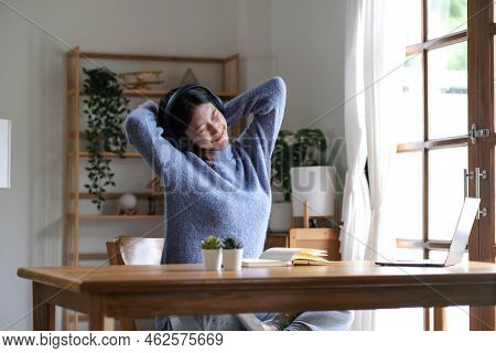 Young Attractive Asian Female Relax Cross Arm Behind Head Use Notebook Digital Online Course Program