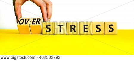 Over Stress Symbol. Psychologist Turns Wooden Cubes And Changes The Concept Word Stress To Over Stre